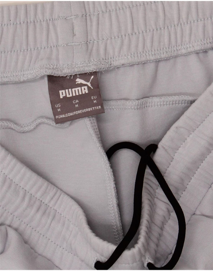 Męskie spodnie dresowe Puma Joggery w kolorze średniego błękitu, bawełniane