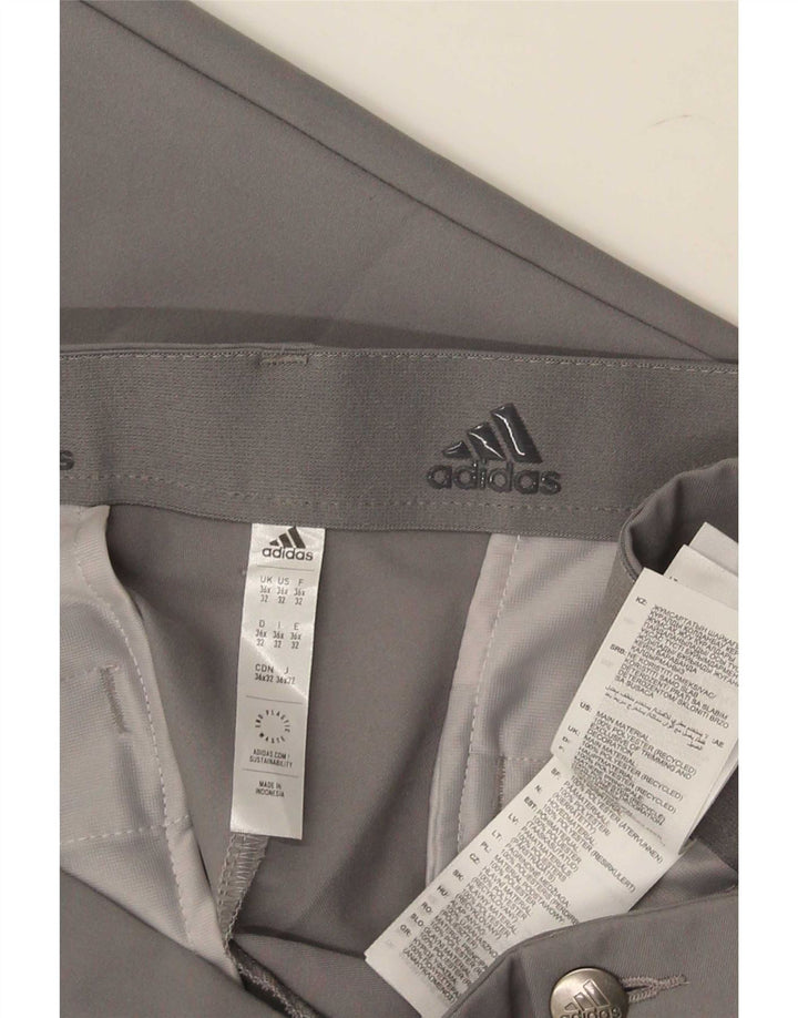Męskie spodnie Chino Adidas W36 L32 Szary poliester