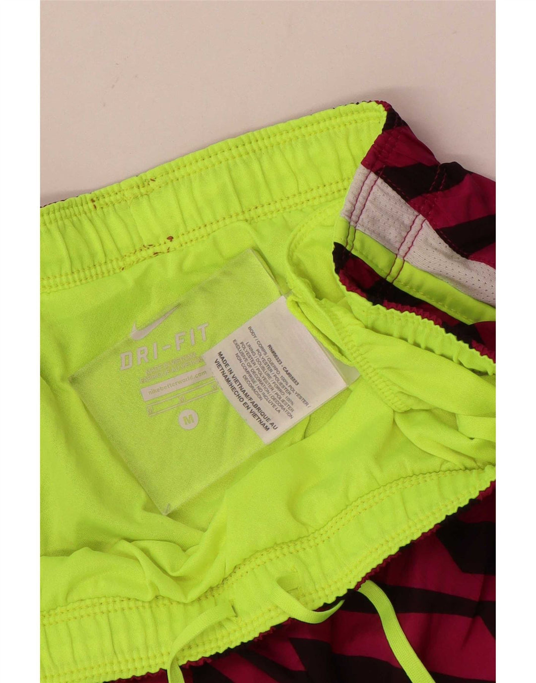 Damskie spodenki sportowe Nike Dri Fit UK 14, poliester w średnie różowe paski