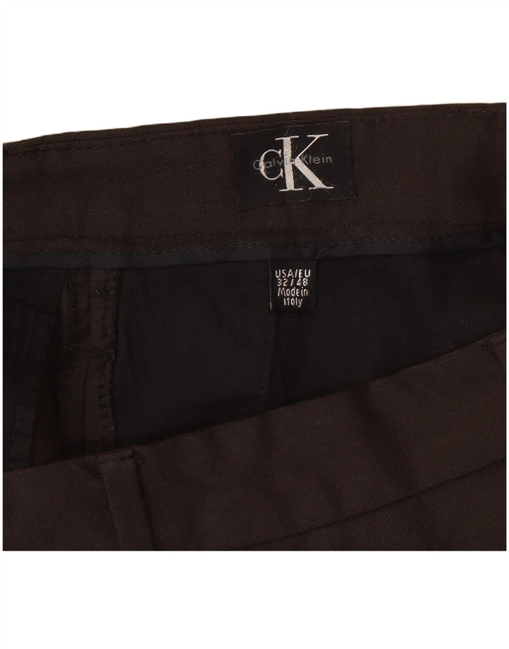 Damskie proste spodnie garniturowe Calvin Klein W32 L30 brązowe