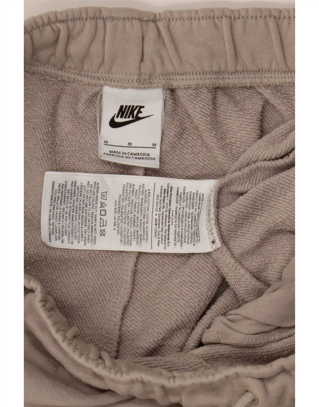 Męskie spodnie dresowe Nike Graphic Joggers w kolorze średniego beżu