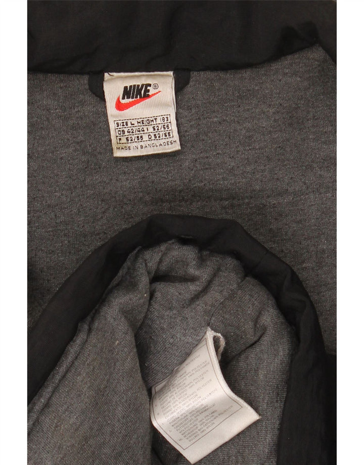 Męska kurtka wiatrówka Nike UK 42/44, duża czarna nylonowa