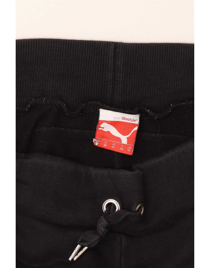 Damskie spodnie dresowe Puma UK 12, średnie czarne, bawełniane