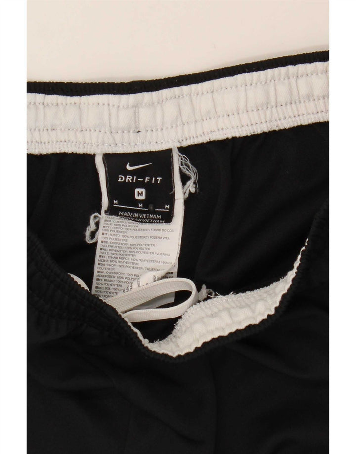 Męskie spodnie dresowe Nike Dri Fit, poliester w kolorze średniej czarnej kolorystyki