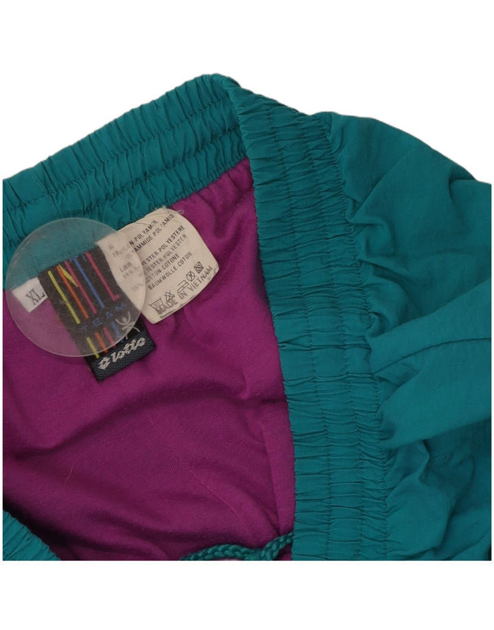 Męskie spodnie dresowe Lotto Graphic Joggers XL Niebieski poliamid