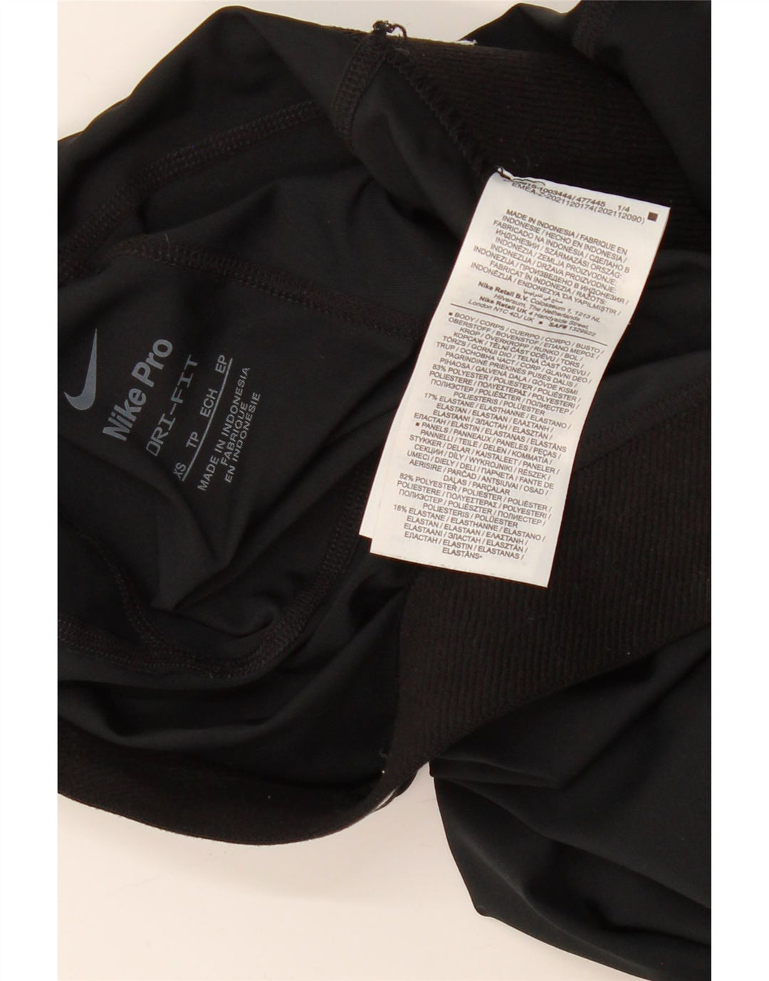 Damskie legginsy NIKE Dri Fit Graphic UK 4 XS, czarny poliester