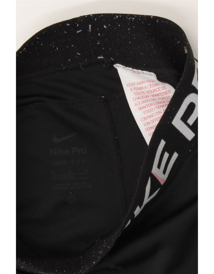 Dziewczęce legginsy z grafiką Nike 10-11 lat, średni czarny poliester