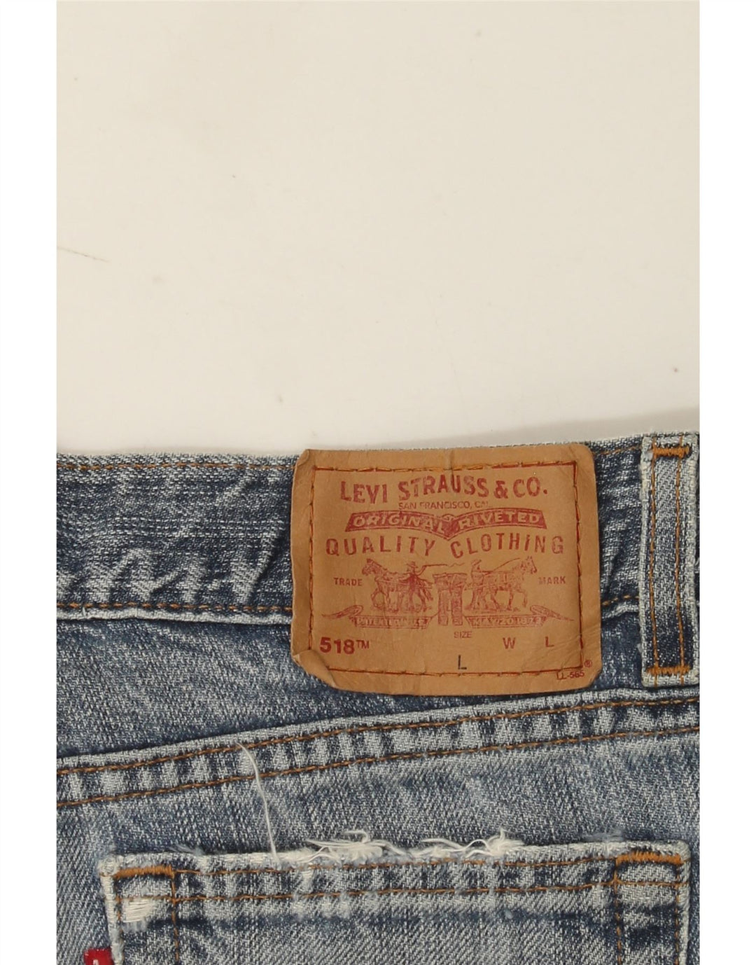 Damskie spodenki jeansowe Levi's 518 W30 Średni niebieski