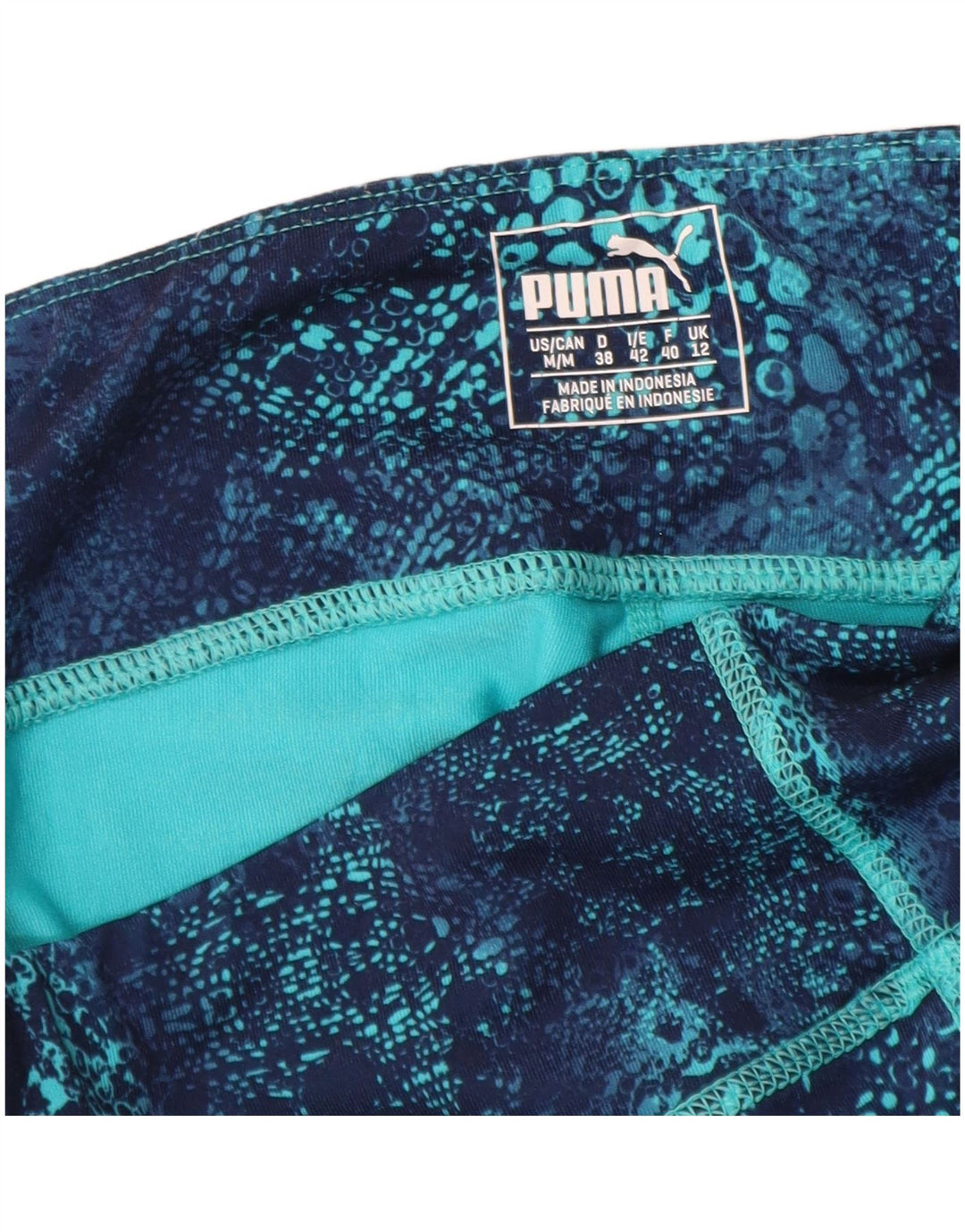 Damskie legginsy Capri PUMA z abstrakcyjnym wzorem UK 12, średni niebieski poliester
