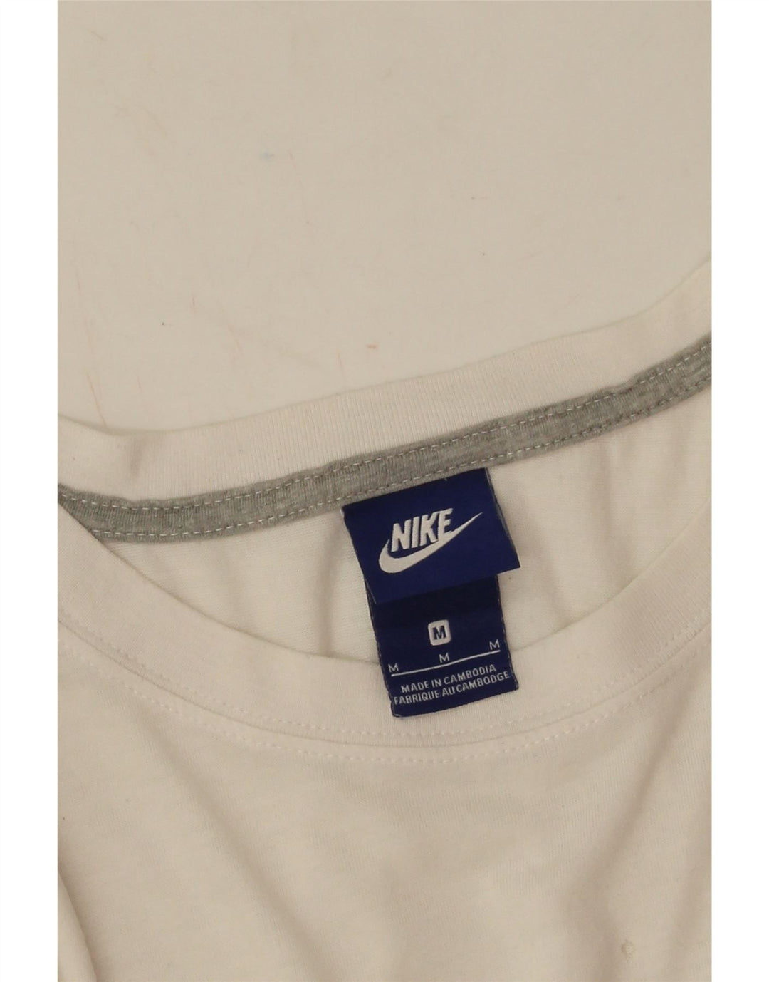 Damska koszulka z grafiką Nike Top UK 14 Średni biały poliester