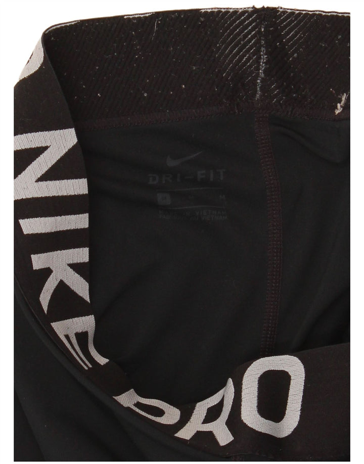 Damskie legginsy Nike Dri Fit Graphic UK 14, średnie czarne