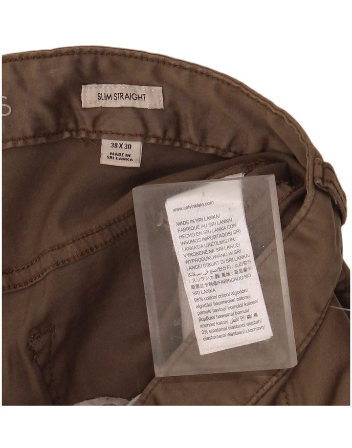 CALVIN KLEIN Męskie spodnie typu slim, proste i codzienne W38 L30 Beżowa bawełna
