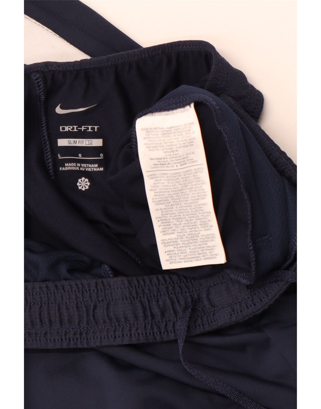 Męskie spodnie dresowe NIKE Dri Fit Slim Fit, duży granatowy poliester