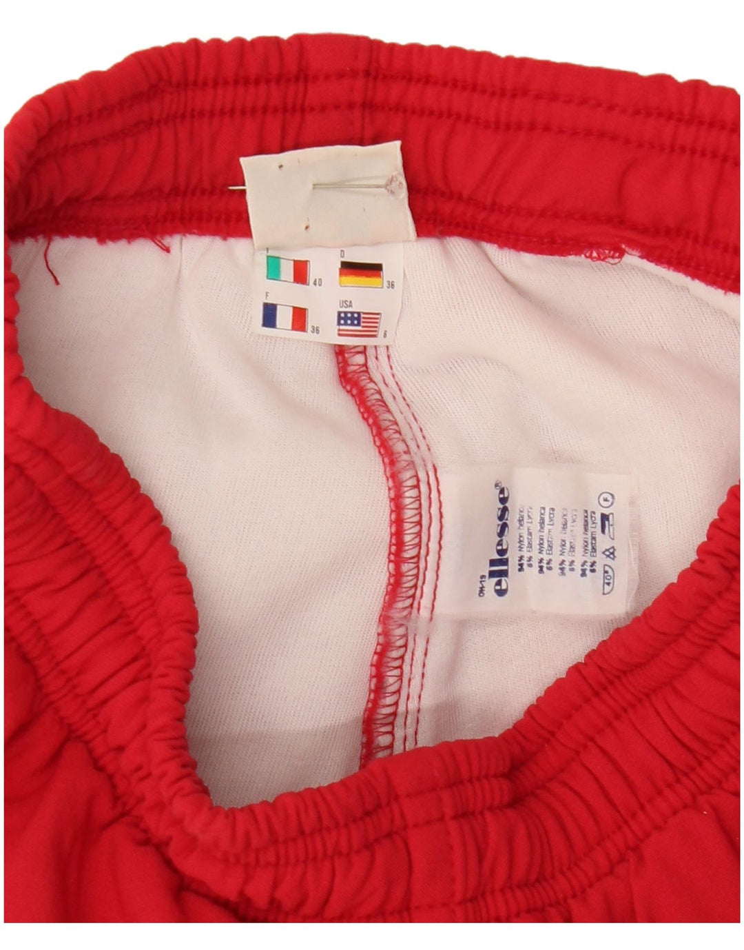 Damskie spodnie wiatrówkowe Ellesse Stirrup US 6, średni czerwony nylon
