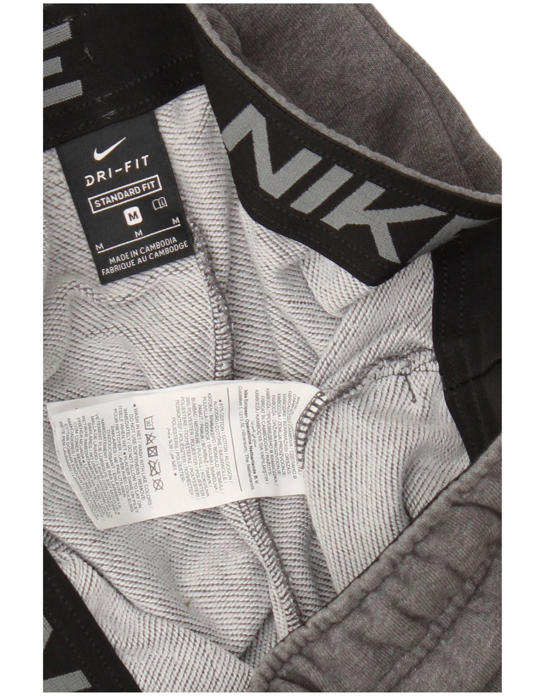 Męskie spodnie dresowe Nike Dri Fit, średnioszare, nakrapiane