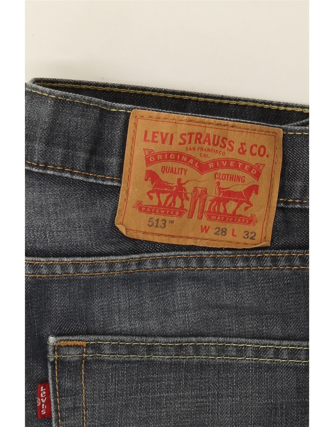 Męskie jeansy Levi's 513 Slim Straight W28 L32 Niebieskie bawełniane