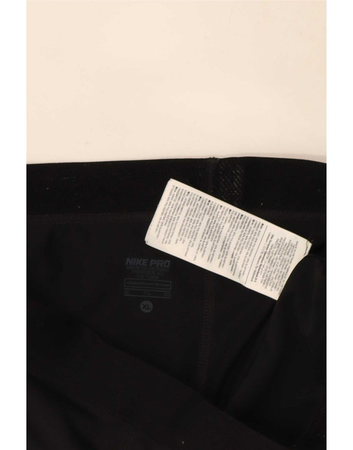 Damskie legginsy Nike Dri Fit Graphic UK 18 XL, czarny poliester