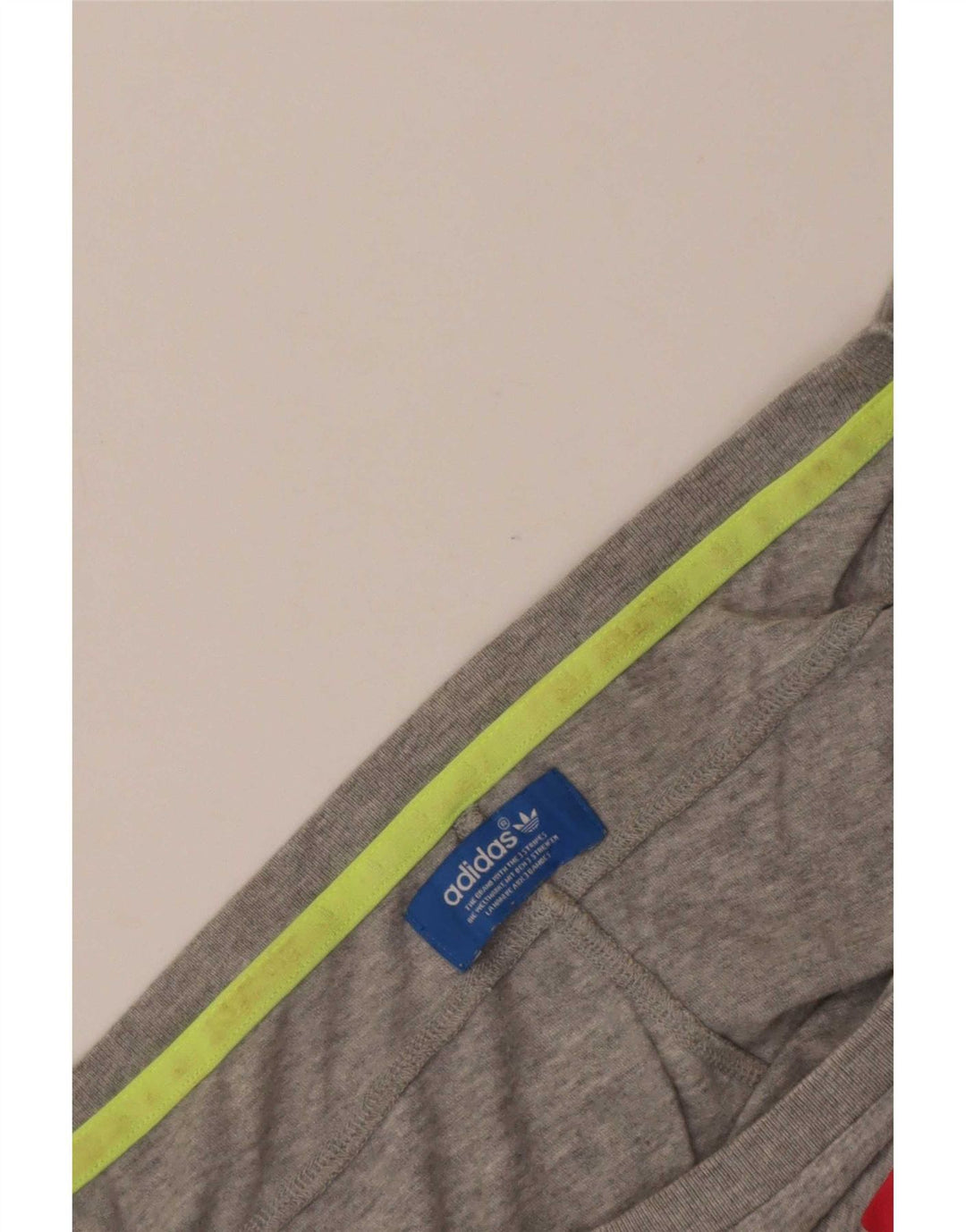 Damska koszulka graficzna Adidas Top UK 16, duża, szara