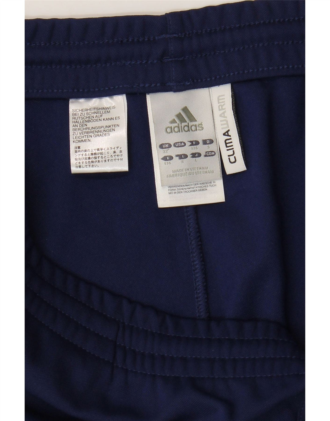 Męskie spodnie dresowe Adidas Climawarm, średnie granatowe