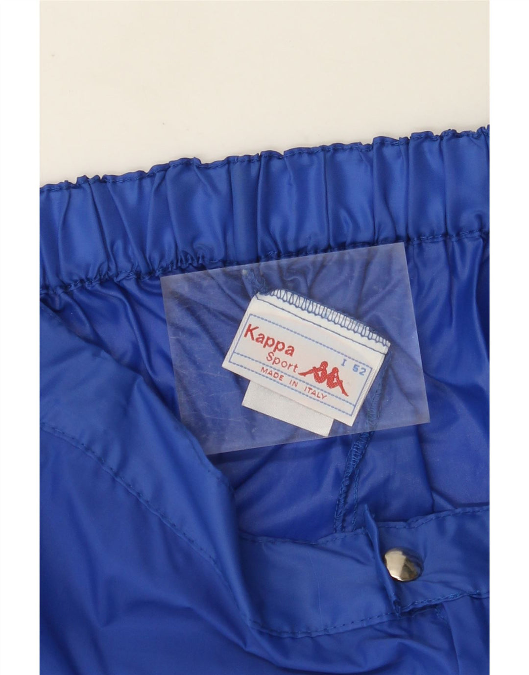 Wodoodporne męskie spodnie KAPPA IT 52 z dużymi niebieskimi blokami kolorów