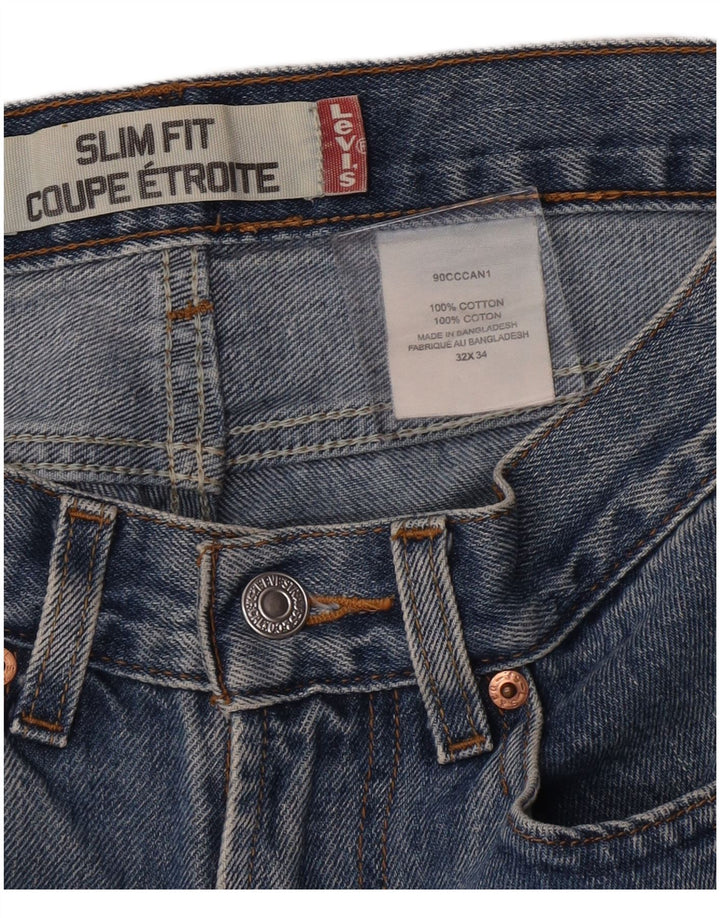 Damskie spodnie jeansowe Levi's Slim Fit W32, duże, niebieskie, bawełniane