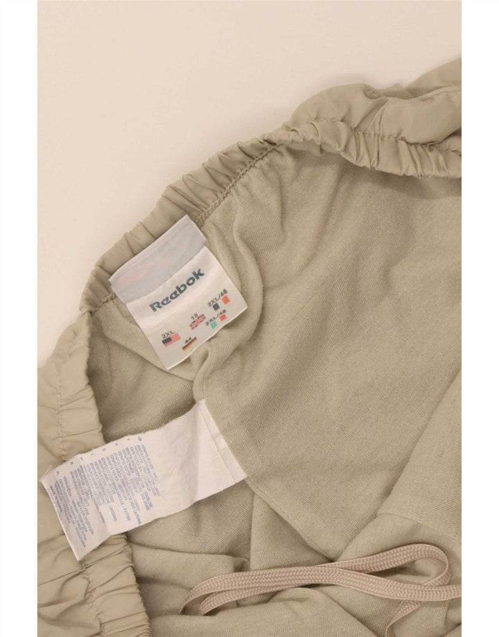 Damskie spodnie dresowe Reebok UK 18 XL Beżowy poliester