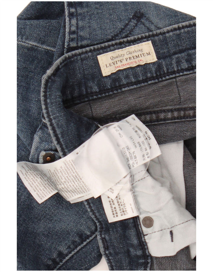 Męskie jeansy LEVI'S 502 zwężane W34 L32 niebieska bawełna
