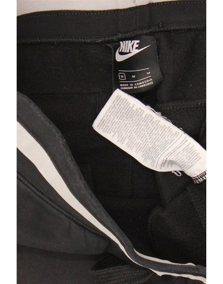 Męskie spodnie dresowe Nike Graphic Joggers, średnia czarna bawełna