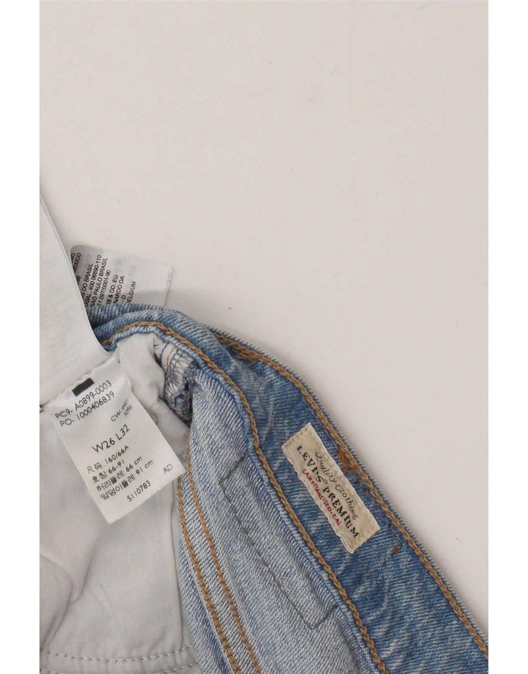 Damskie jeansy Levi's z wysokim stanem, rozkloszowane W26 L32, niebieska bawełna