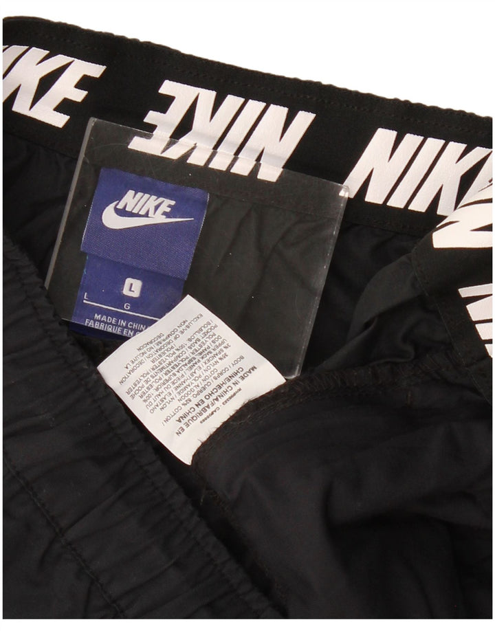 Damskie spodnie dresowe Nike UK 14, duże, czarne, bawełniane
