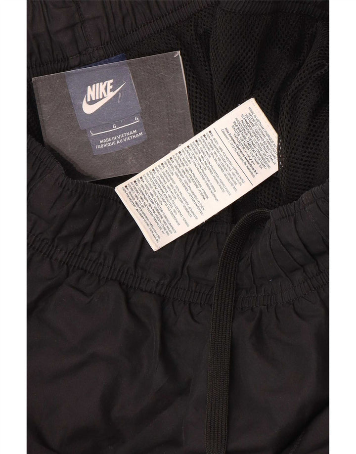 Męskie spodnie dresowe Nike, duże, czarne