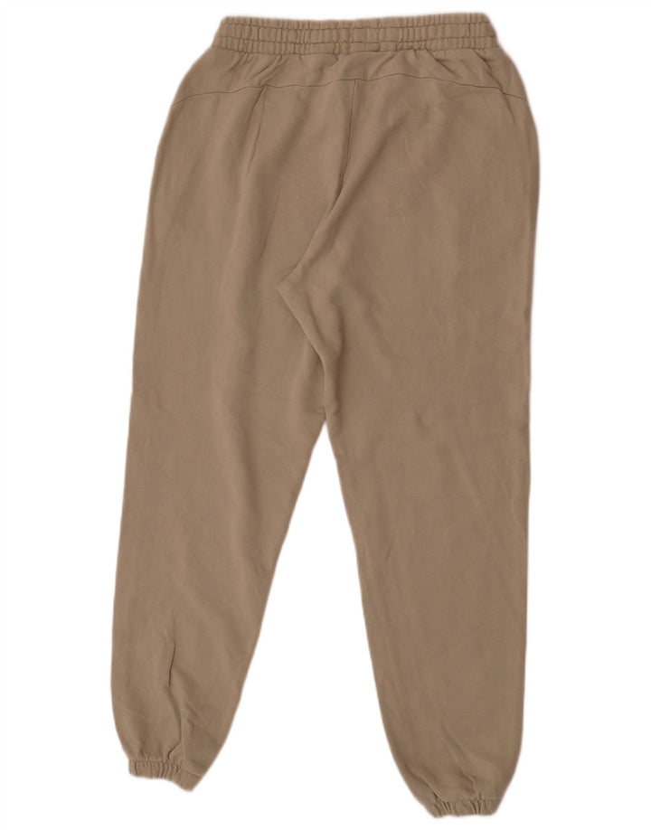 Męskie spodnie dresowe Puma Joggers w kolorze średniego beżu, bawełny