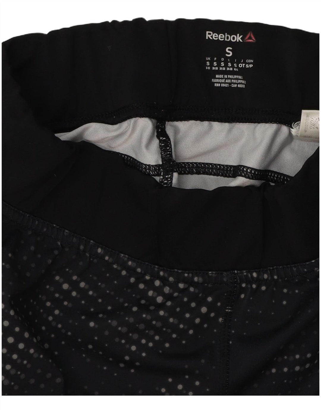 Damskie legginsy REEBOK Capri z grafiką UK 8/10, małe, czarne w cętki