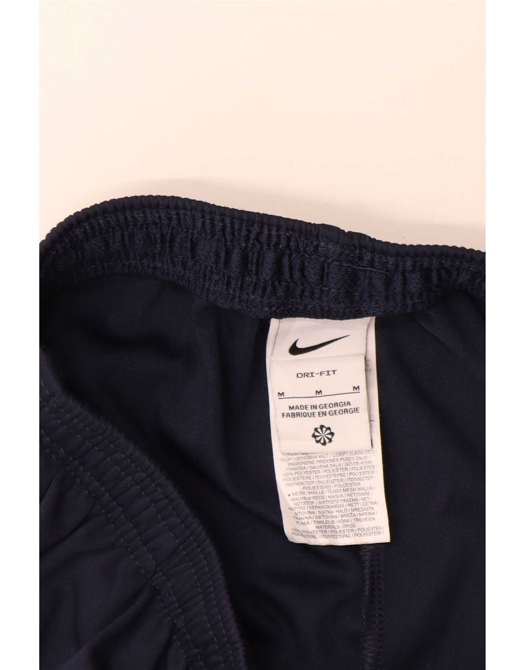 Męskie spodnie dresowe Nike, średni granatowy, poliester z blokami kolorów