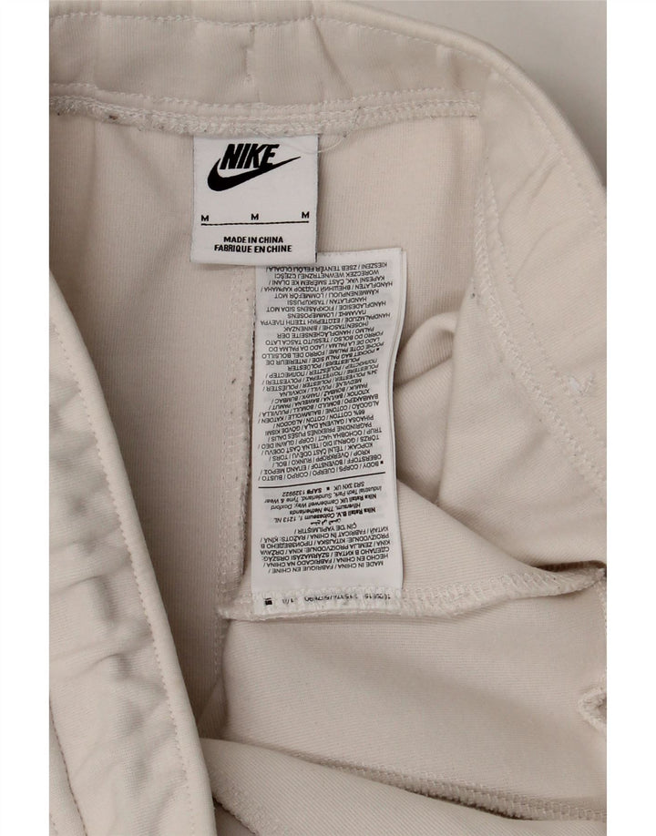 Męskie spodnie dresowe Nike, joggery, średnia biała bawełna