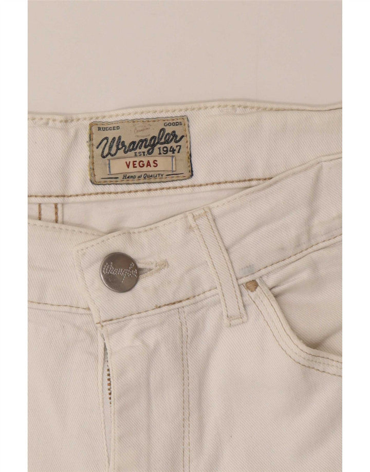 Damskie jeansy Wrangler Vegas W30 L32 białe