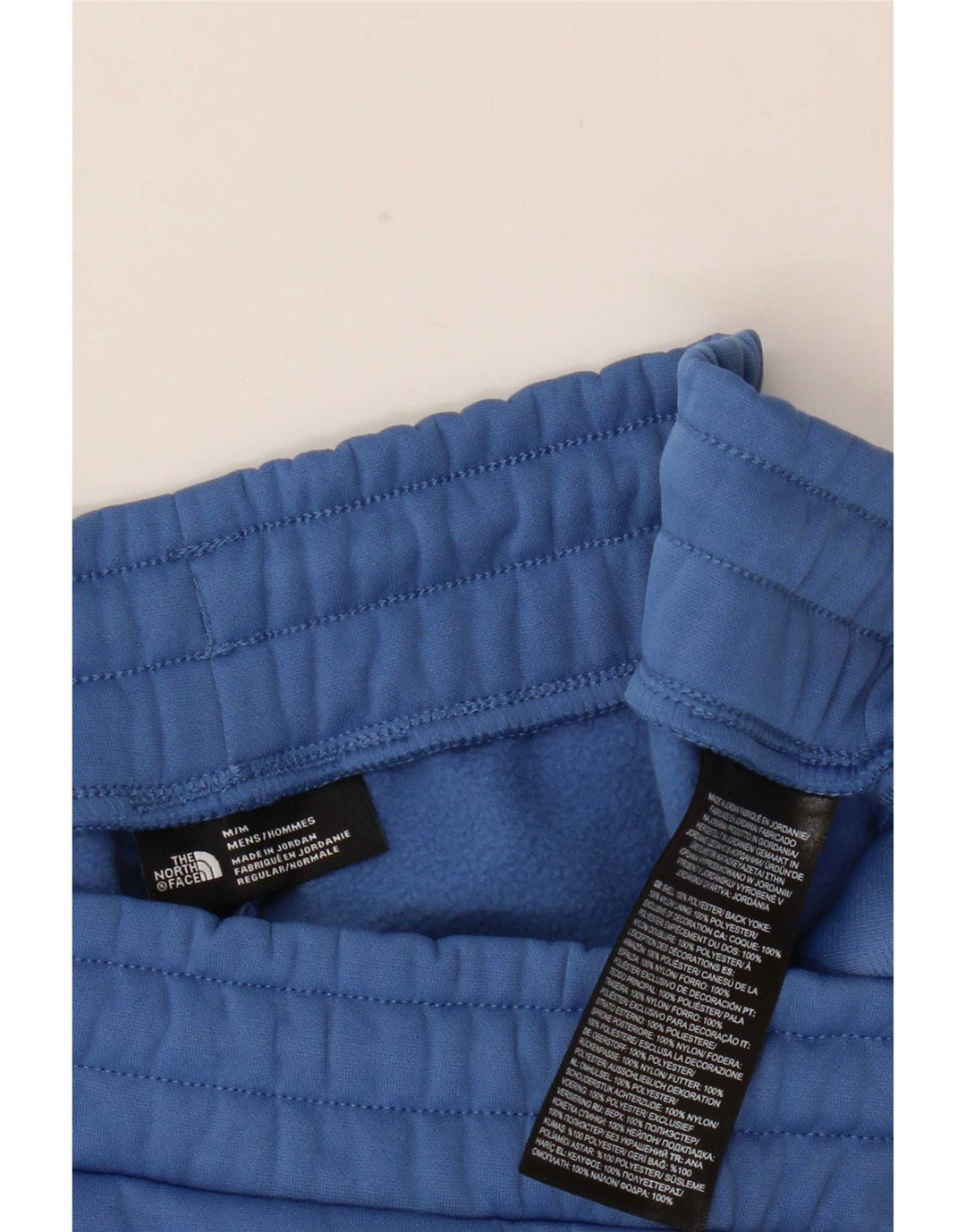 Męskie spodnie dresowe The North Face Joggers w kolorze średnioniebieskim