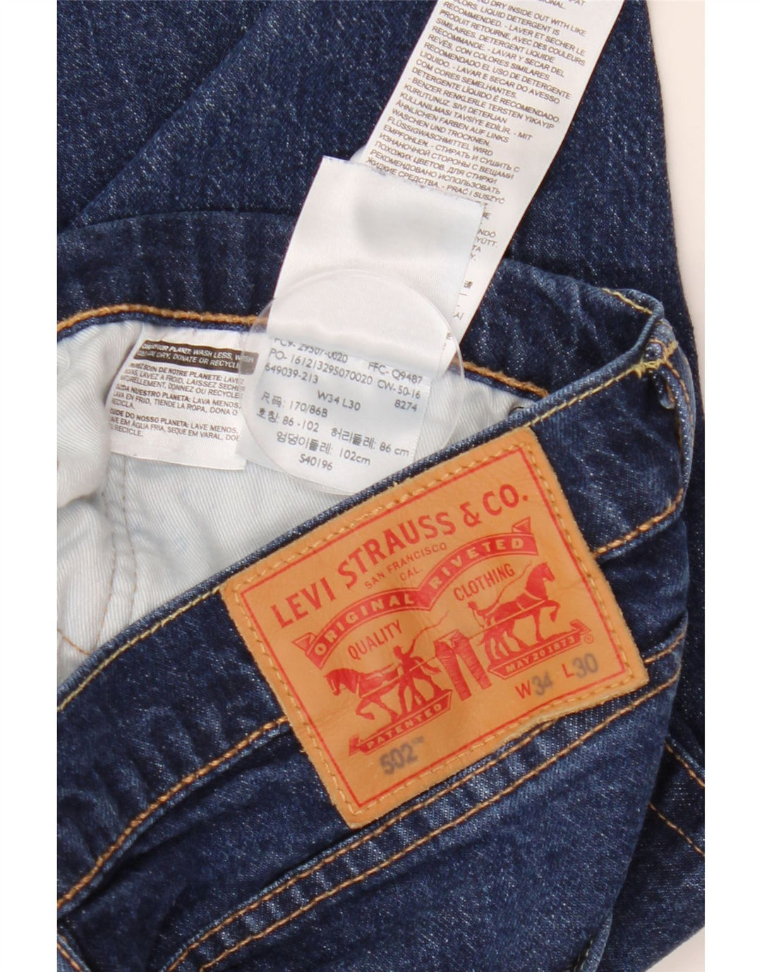 Męskie jeansy LEVI'S 502 Tapered W34 L30 Granatowa bawełna