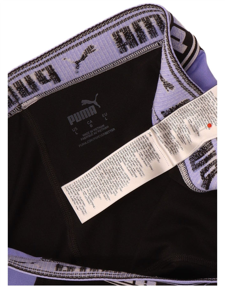 Damskie legginsy Puma Graphic UK 16, duży, czarny, poliestrowy blok kolorów