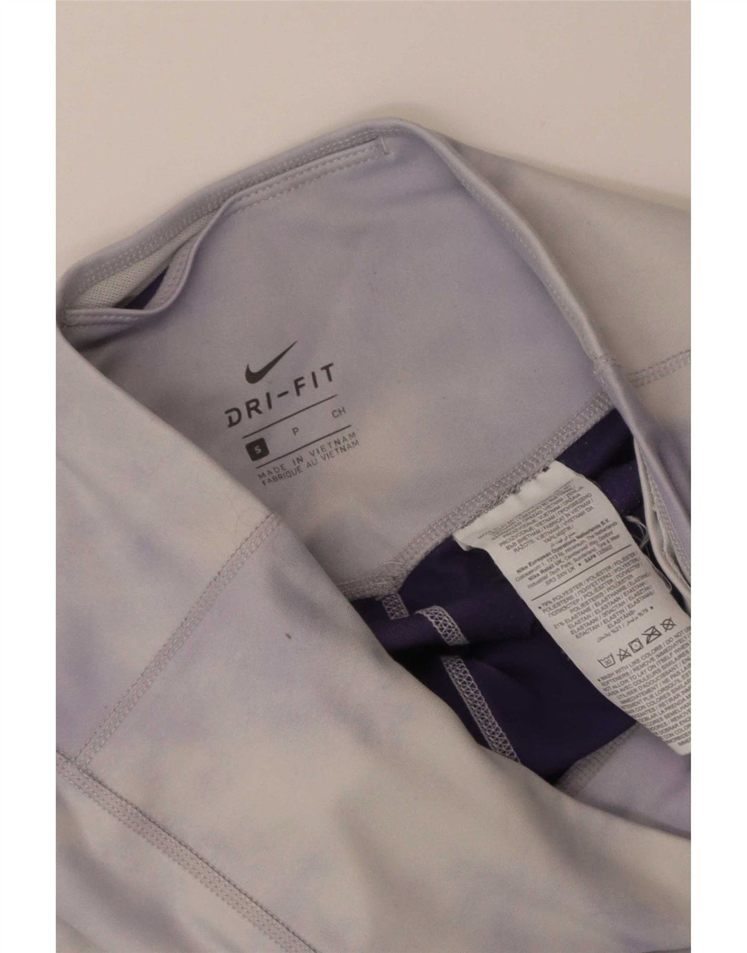 Damskie legginsy Nike Dri Fit Capri UK 8, mały, fioletowy, poliestrowy krawat