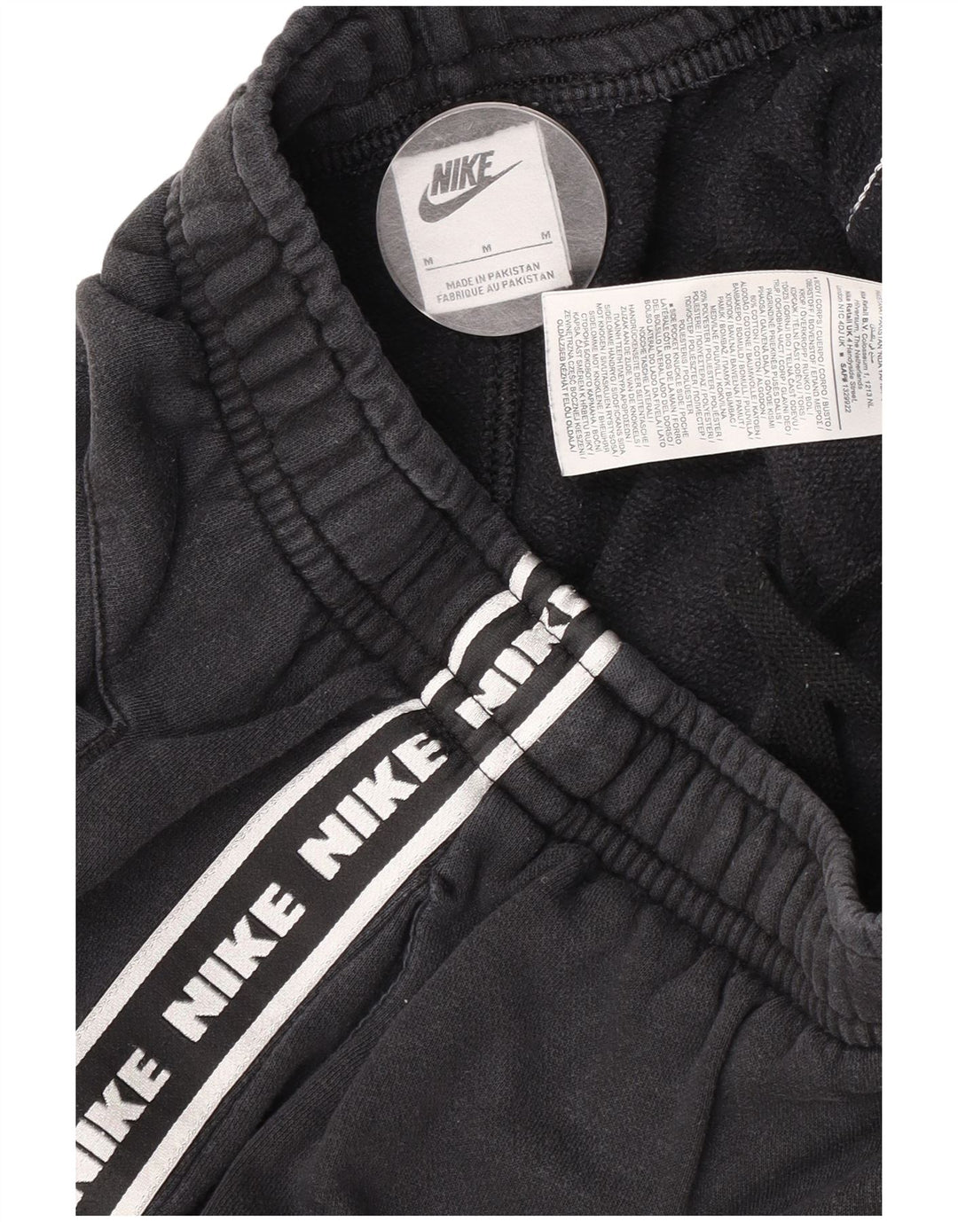 Męskie spodnie dresowe Nike Graphic Joggers, średnia czarna bawełna