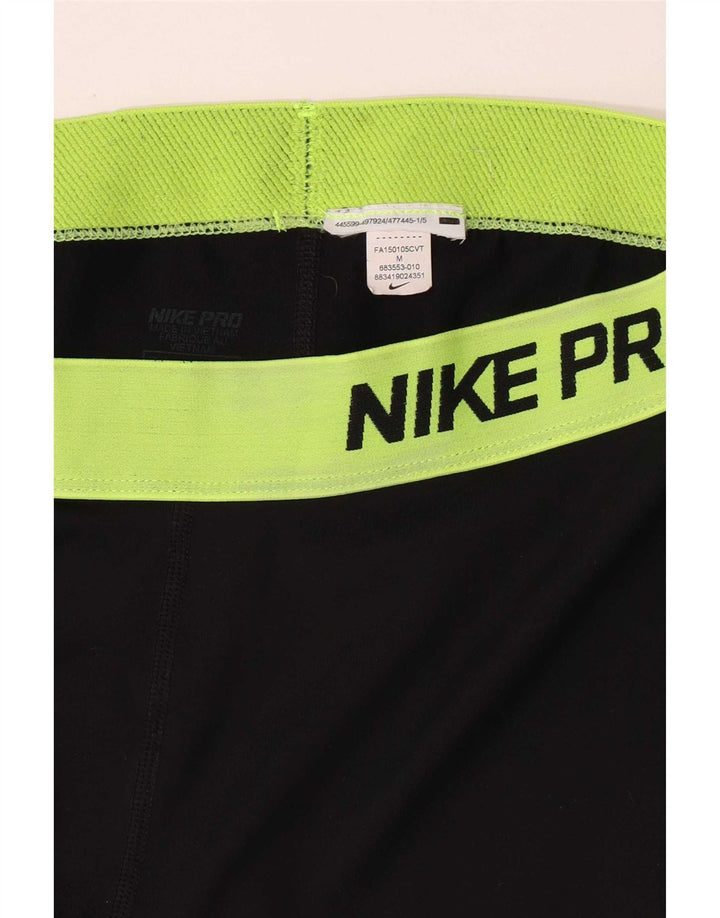 Damskie legginsy Nike Graphic Capri UK 12 w kolorze średniej czerni