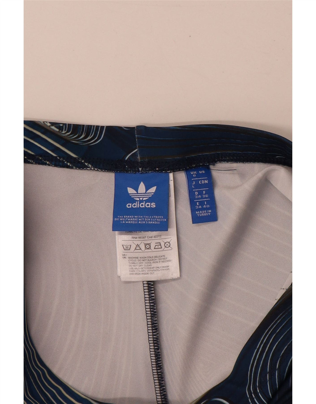 Damskie legginsy Adidas z abstrakcyjnym wzorem UK 8, małe, granatowe, poliestrowe