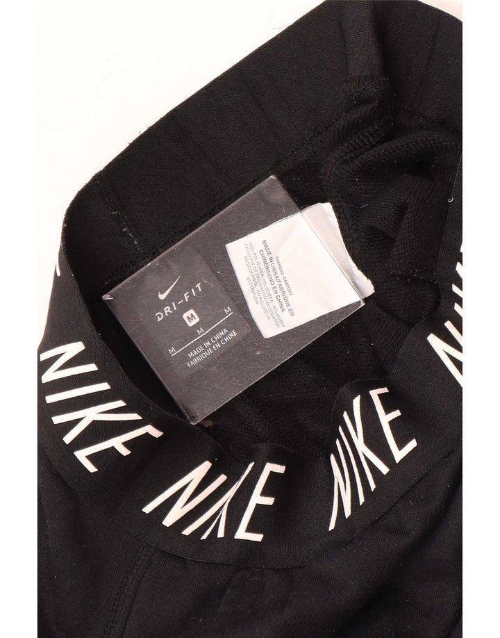 Damskie spodnie dresowe Nike Graphic Joggers UK 12 Średni czarny poliester