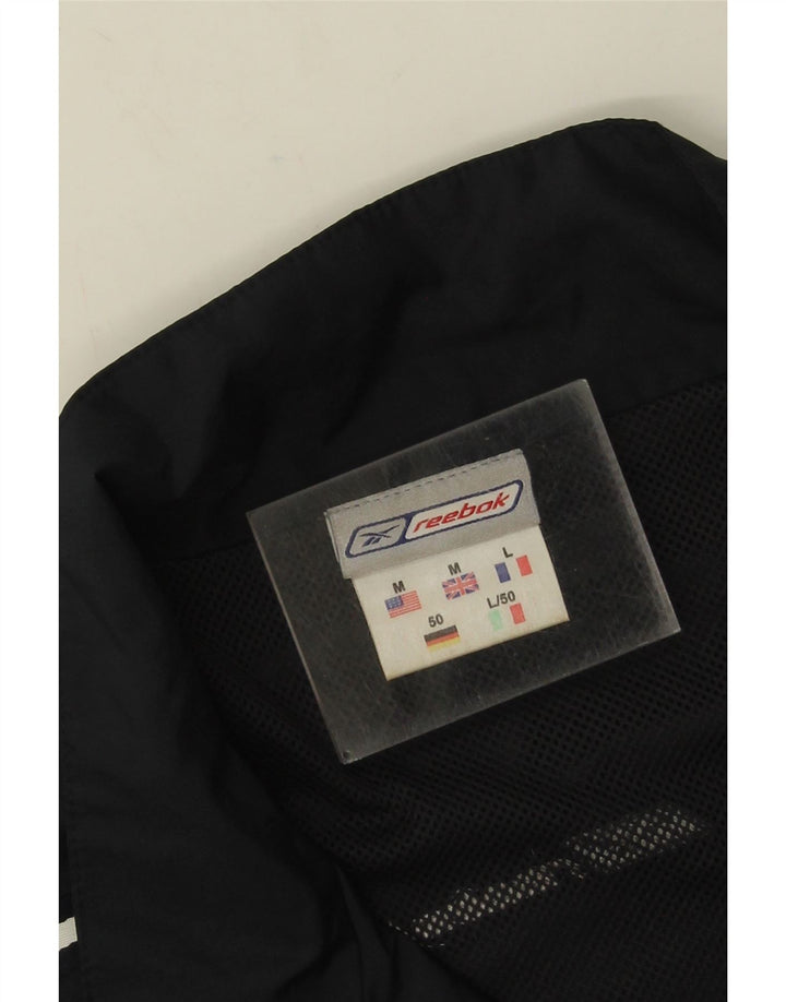 Męska kurtka dresowa Reebok o luźnym kroju, średnia czarna, z blokami kolorów