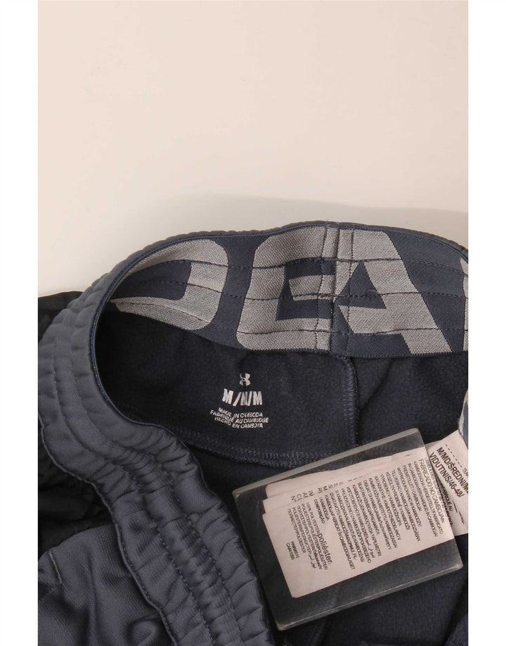 Męskie spodnie dresowe Under Armour Joggers w kolorze średnioszarym